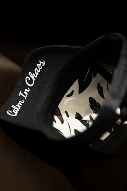 Calm In Chaos Trucker Hat – (PRE-ORDER)