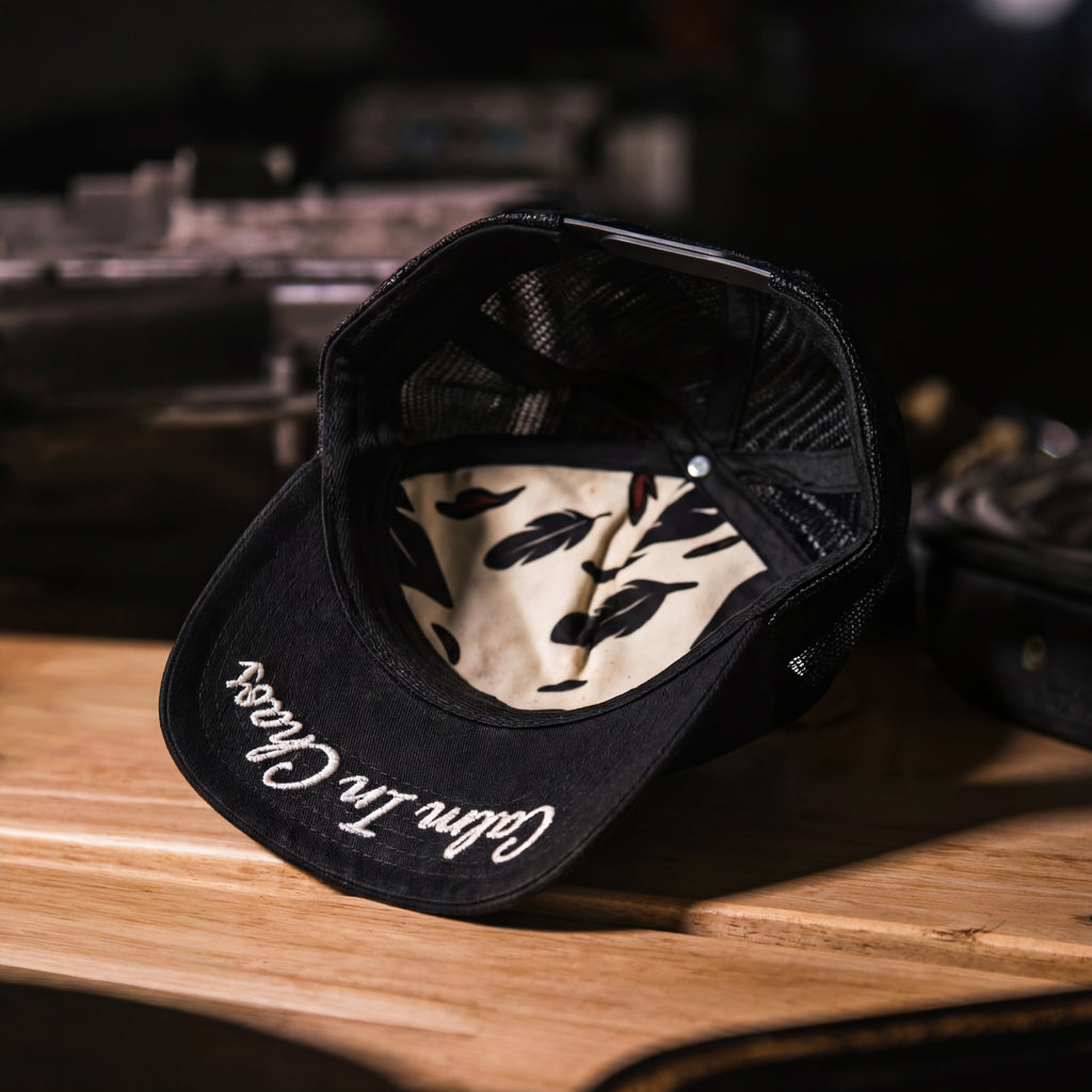 Calm In Chaos Trucker Hat